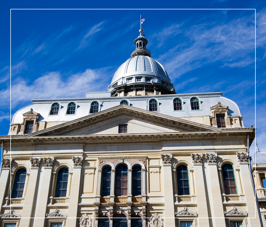 Classical building under a bright blue sky